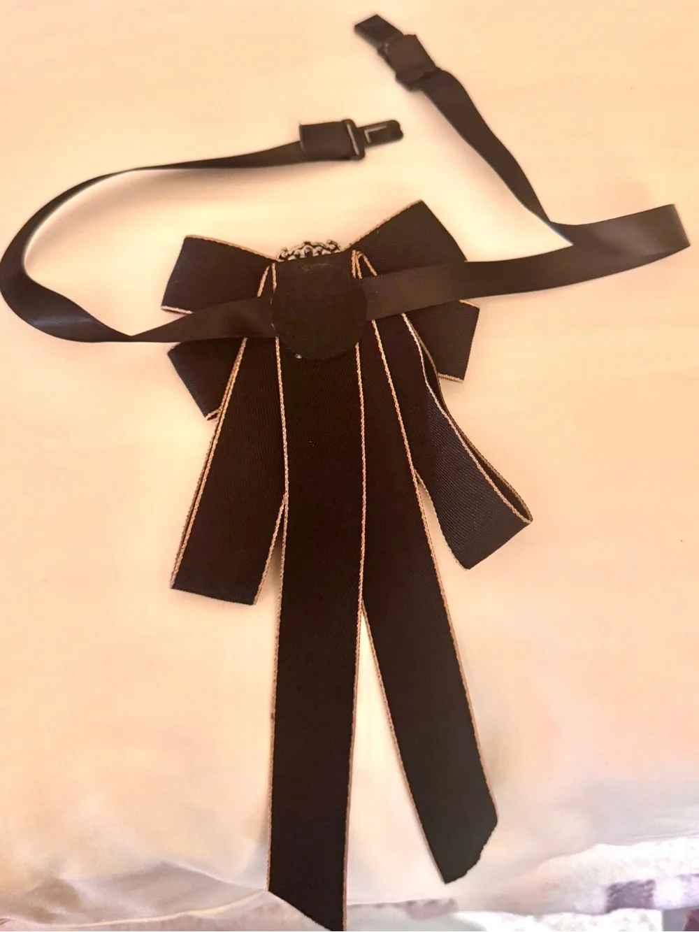Black Ribbon Bow Brooch with Crystal Center